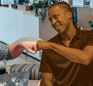 Team brainstorming digital marketing strategies at Orange Pegs growth marketing agency