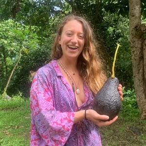 Sara Vargo with a large avocado